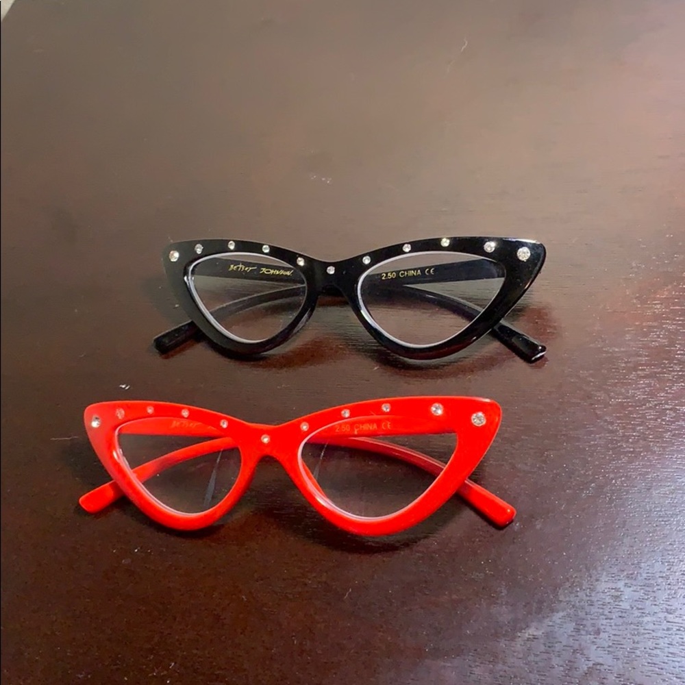 Betty Johnson.  Reading glasses